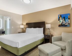 Day room with ensuite and a couch at Best Western Fort Lee.