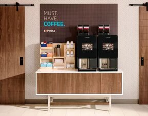 Coffee station at Holiday Inn Express Chicago - Downers Grove.