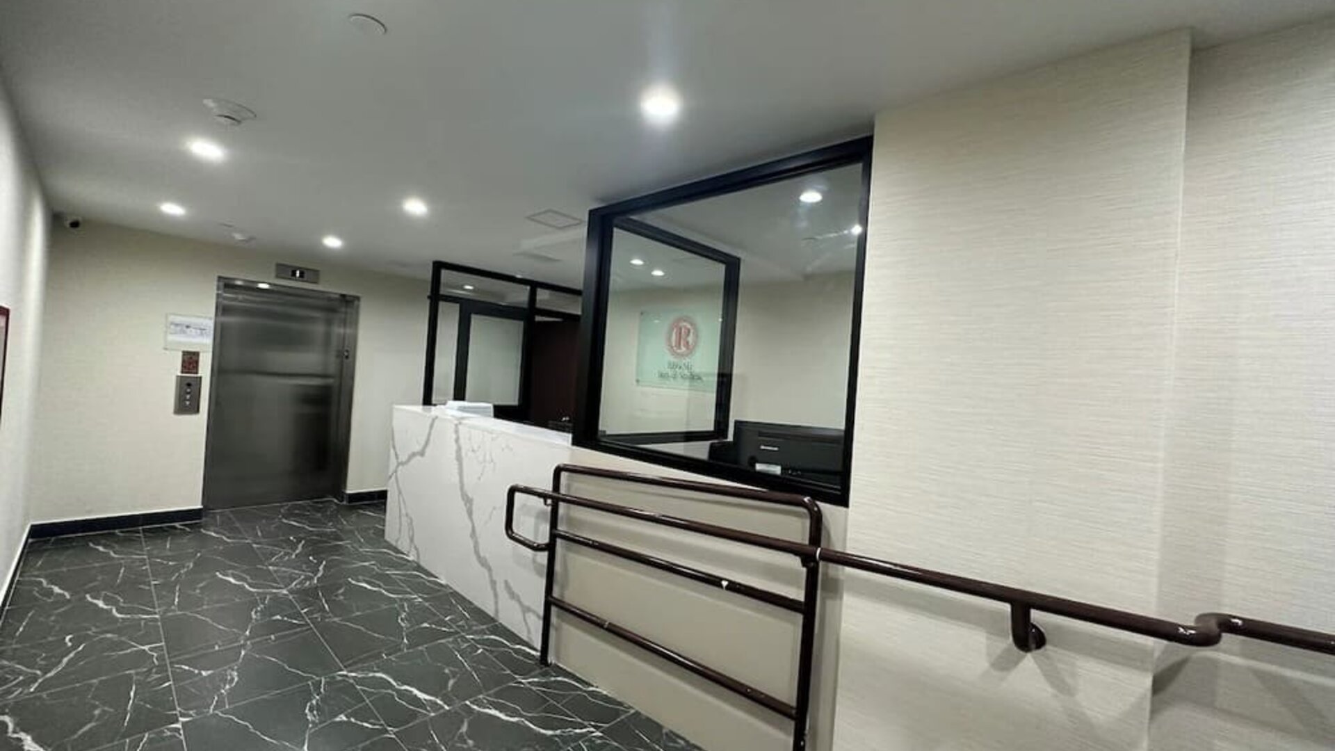 Reception area at Regal Inn & Suites New York.