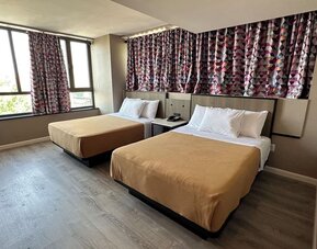 Day room at Regal Inn & Suites New York.