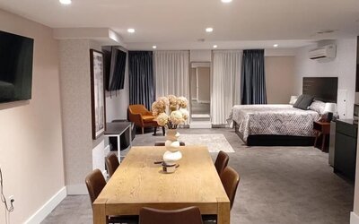 Day room with workspace at Rose Hotel, Bronx.