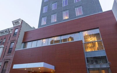 Exterior view of the hotel building with street-level entrance at Edge Hotel NYC.