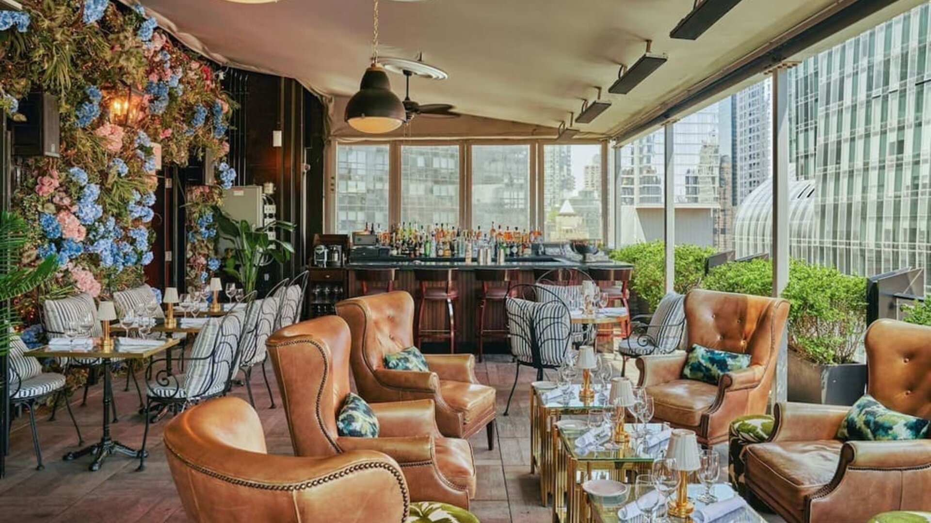 Lounge area with comfortable seating and bar setup at Le Méridien New York, Central Park.