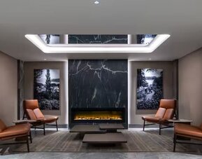 Lounge and lobby with fireplace at DoubleTree By Hilton Istanbul Macka.