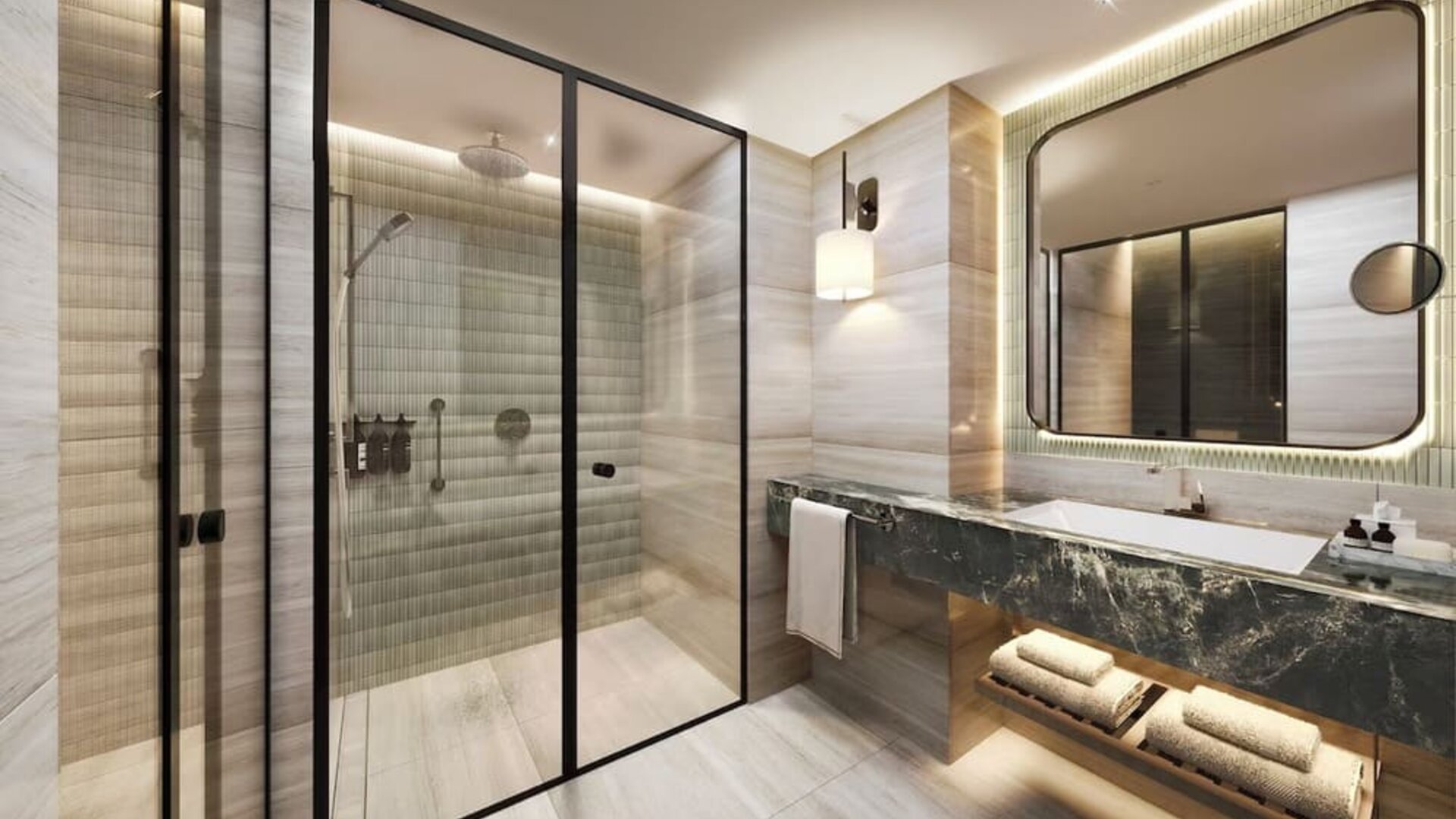 Guest bathroom with shower and basin at DoubleTree By Hilton Istanbul Macka.