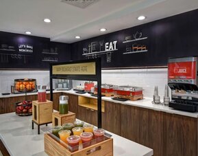 Breakfast available at Hampton Inn NY-JFK.