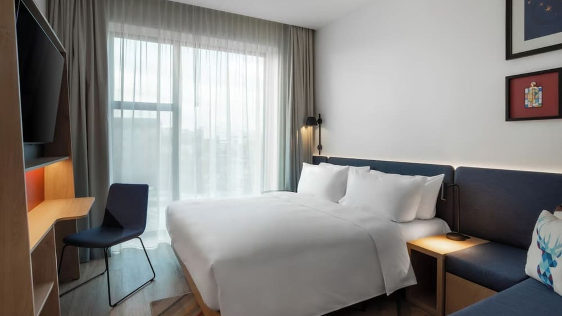 day use room with TV and work desk at Hampton By Hilton Tallinn.