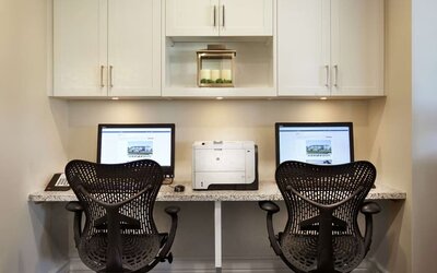 Business center with computers and printer at Hilton Garden Inn Montreal Airport.
