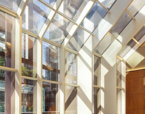 Bright atrium with floor-to-ceiling windows and natural light at Hyatt Regency Times Square.