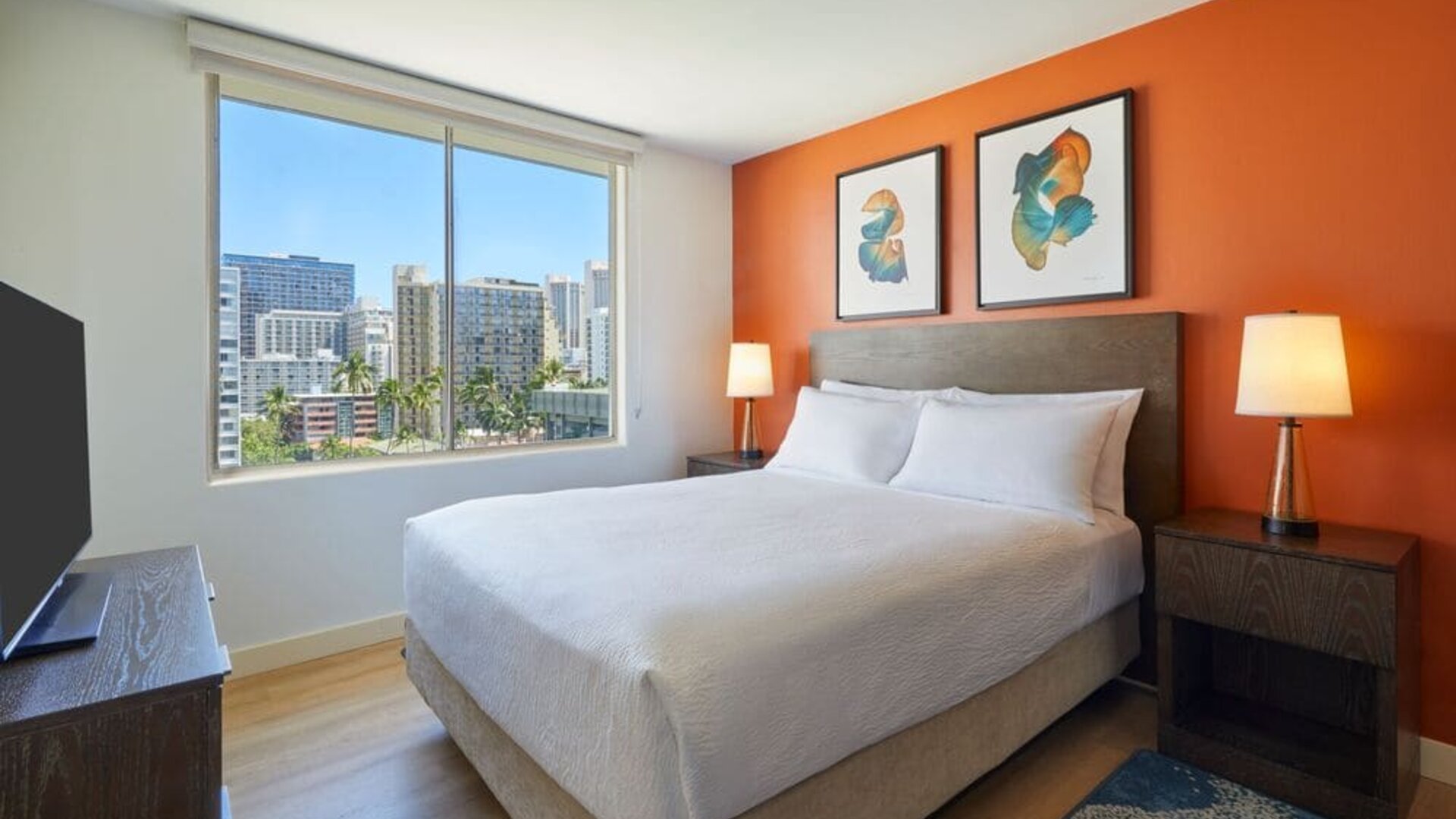 King guest room with city views at Courtyard Waikiki Beach.