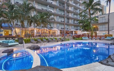 Resort-style outdoor pool area at Courtyard Waikiki Beach.