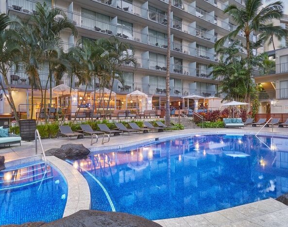 Resort-style outdoor pool area at Courtyard Waikiki Beach.