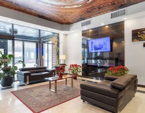 Elegant reception and lounge area at Hotel Montreal Metropolitan, An Ascend Collection Hotel.