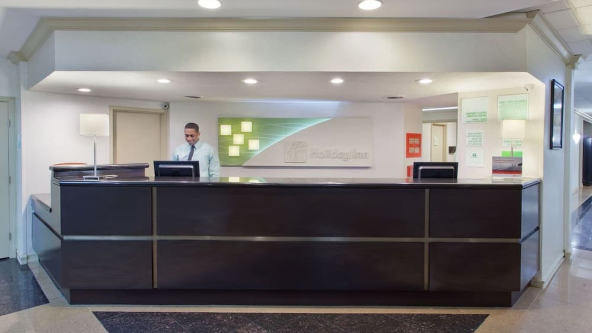 Front reception desk and check-in area at Holiday Inn Downtown Shreveport.