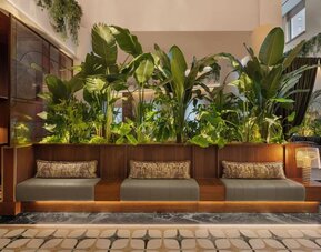 Sophisticated hotel lobby with lounge seating and modern décor at Hyatt Union Square New York.