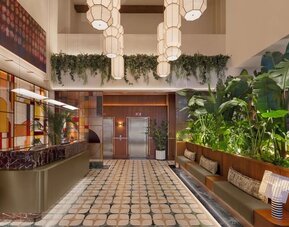 Reception and check-in area with artistic décor at Hyatt Union Square New York.
