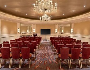 Ballroom-style meeting and event space with chandelier lighting and theater seating at Hyatt Regency Boston.