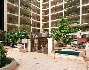 Lobby and coworking lounge at Embassy Suites By Hilton Arcadia.