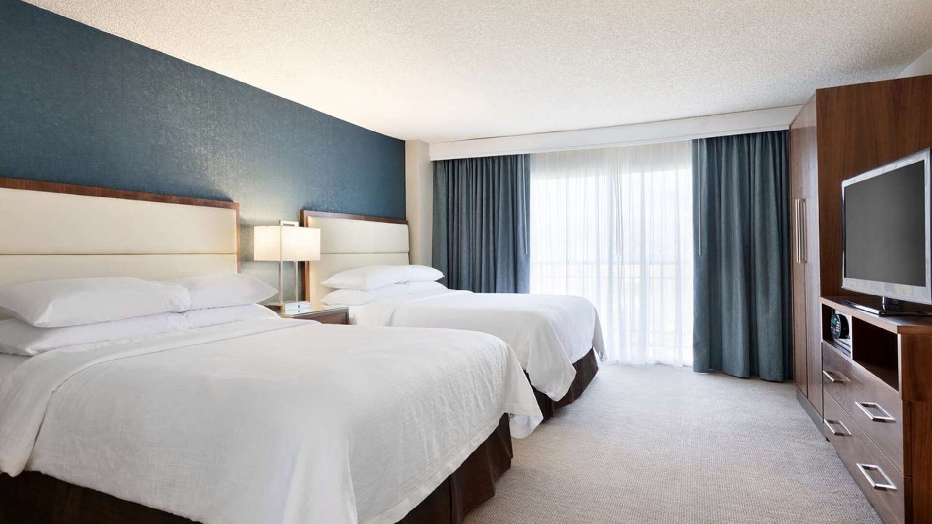 Twin bed available at Embassy Suites By Hilton Brea North Orange County.