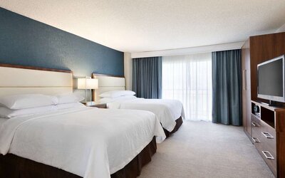 Twin bed available at Embassy Suites By Hilton Brea North Orange County.