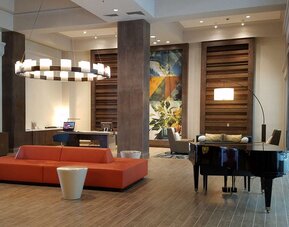 Lobby and coworking lounge at Embassy Suites By Hilton Brea North Orange County.