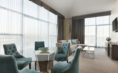 Living area inside day use room at Embassy Suites By Hilton Brea North Orange County.