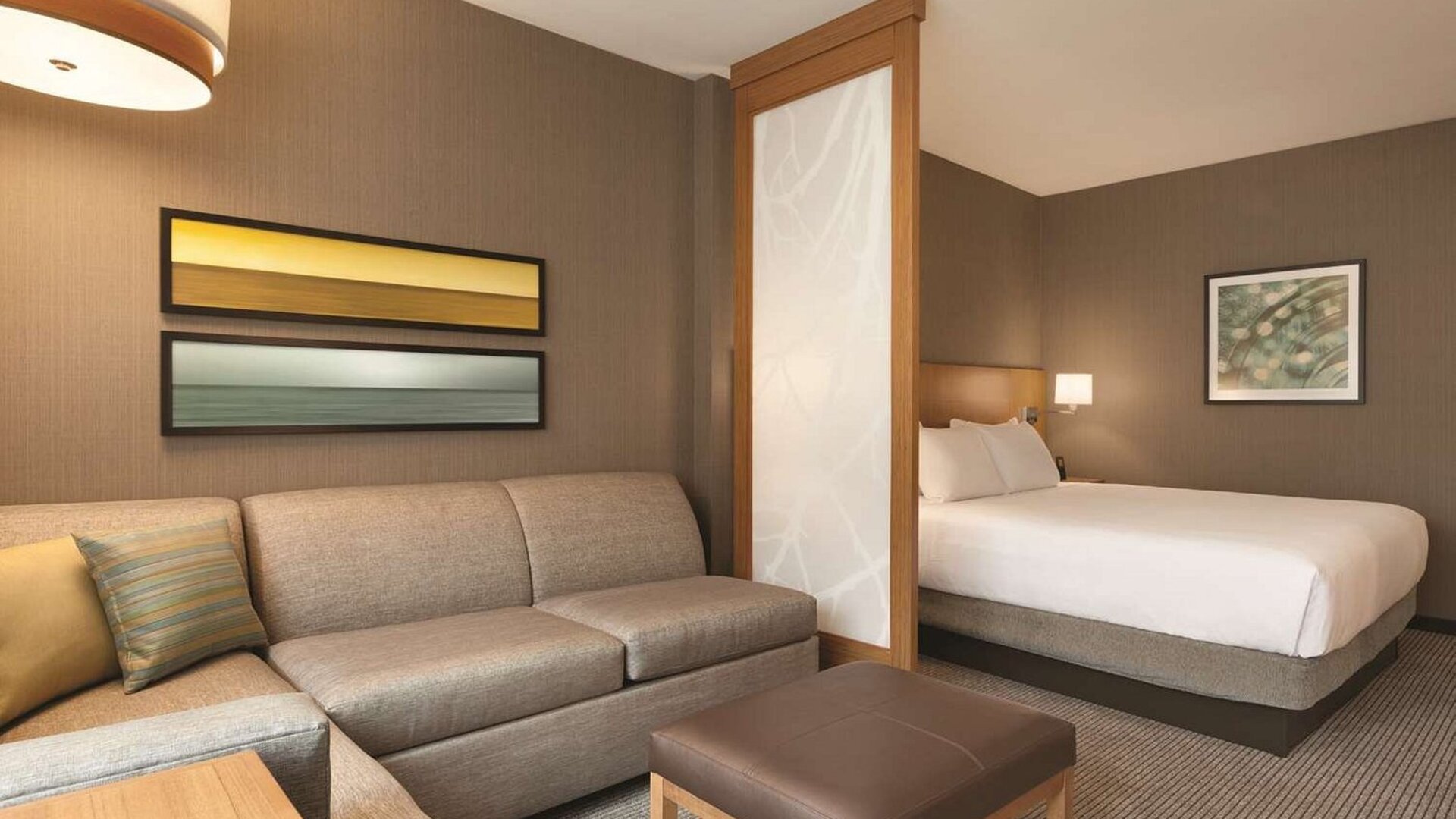 Day use room with sofa at Hyatt Place West End Georgetown.