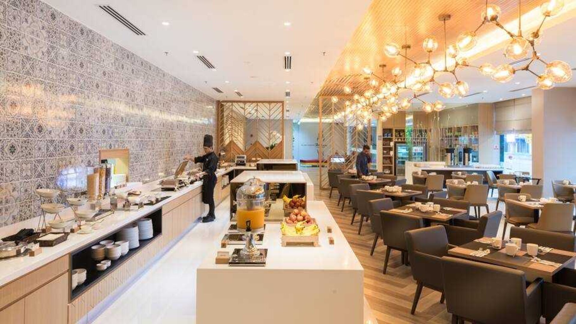 Elegant restaurant area with buffet at the Hilton Garden Inn Kuala Lumpur Jalan Tuanku Abdul Rahman North.
