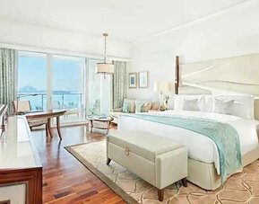 Bright and comfortable king room with sea view at the Waldorf Astoria Dubai Palm Jumeirah.