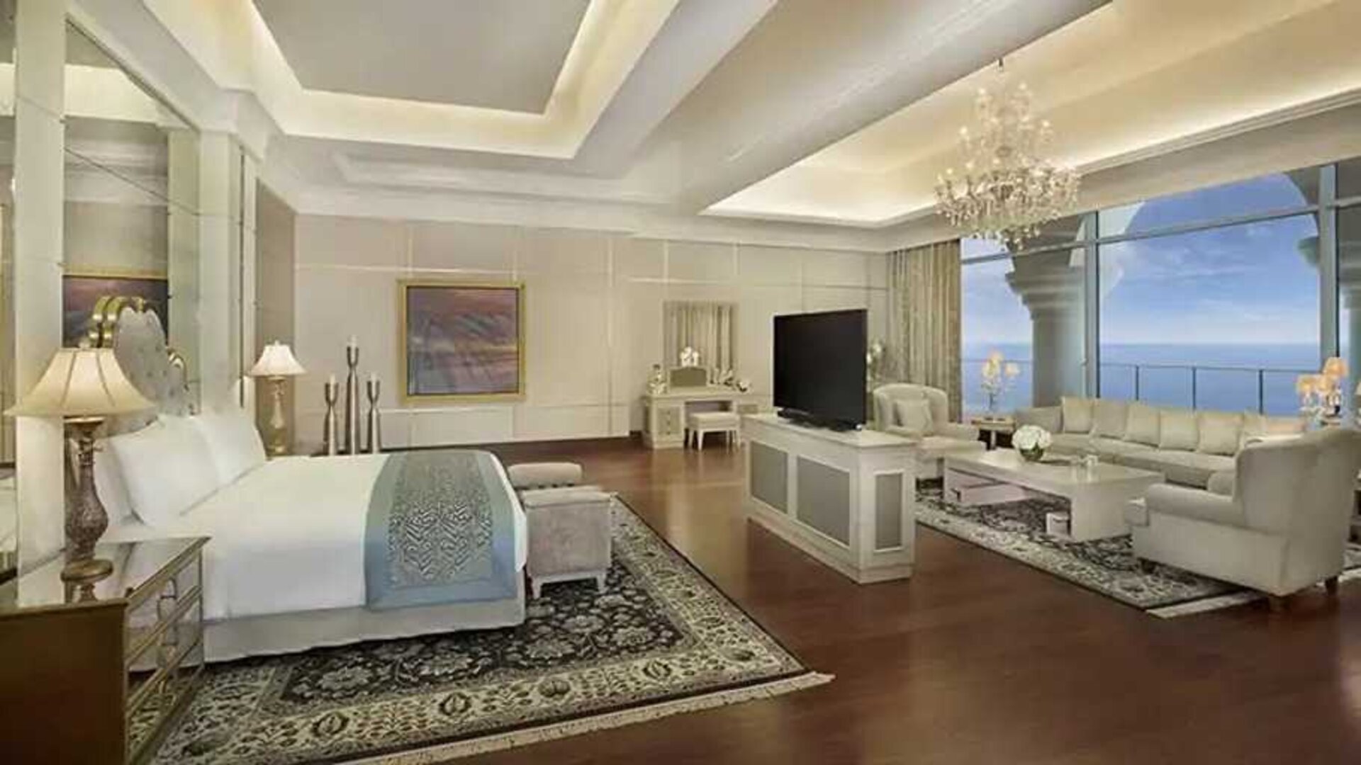 Deluxe suite with separate living room and sea view at the Waldorf Astoria Dubai Palm Jumeirah.