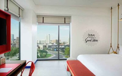 Bright king room with city view at the Hampton by Hilton Dubai Al Seef.