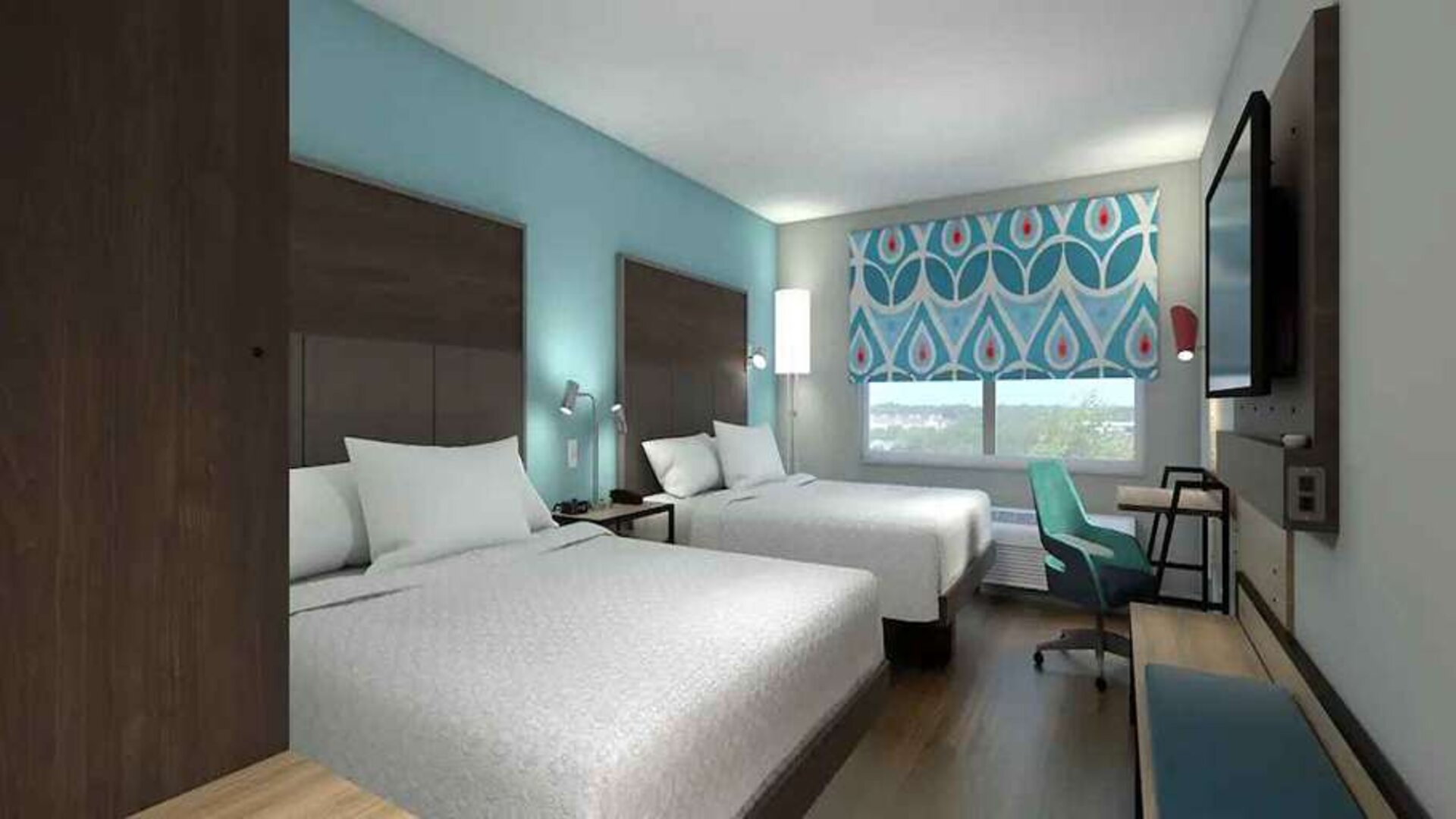 Double king beds with work desk area at Tru by Hilton Edinburg.
