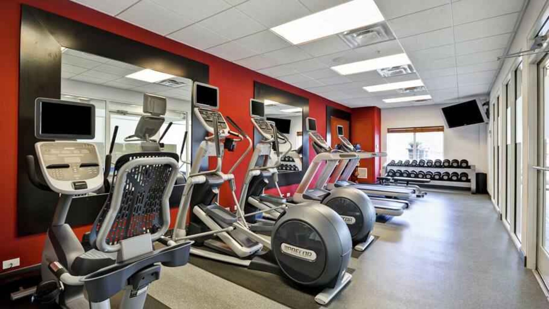 Fitness center with treadmills and exercise bikes at the Hilton Garden Inn Fort Collins.