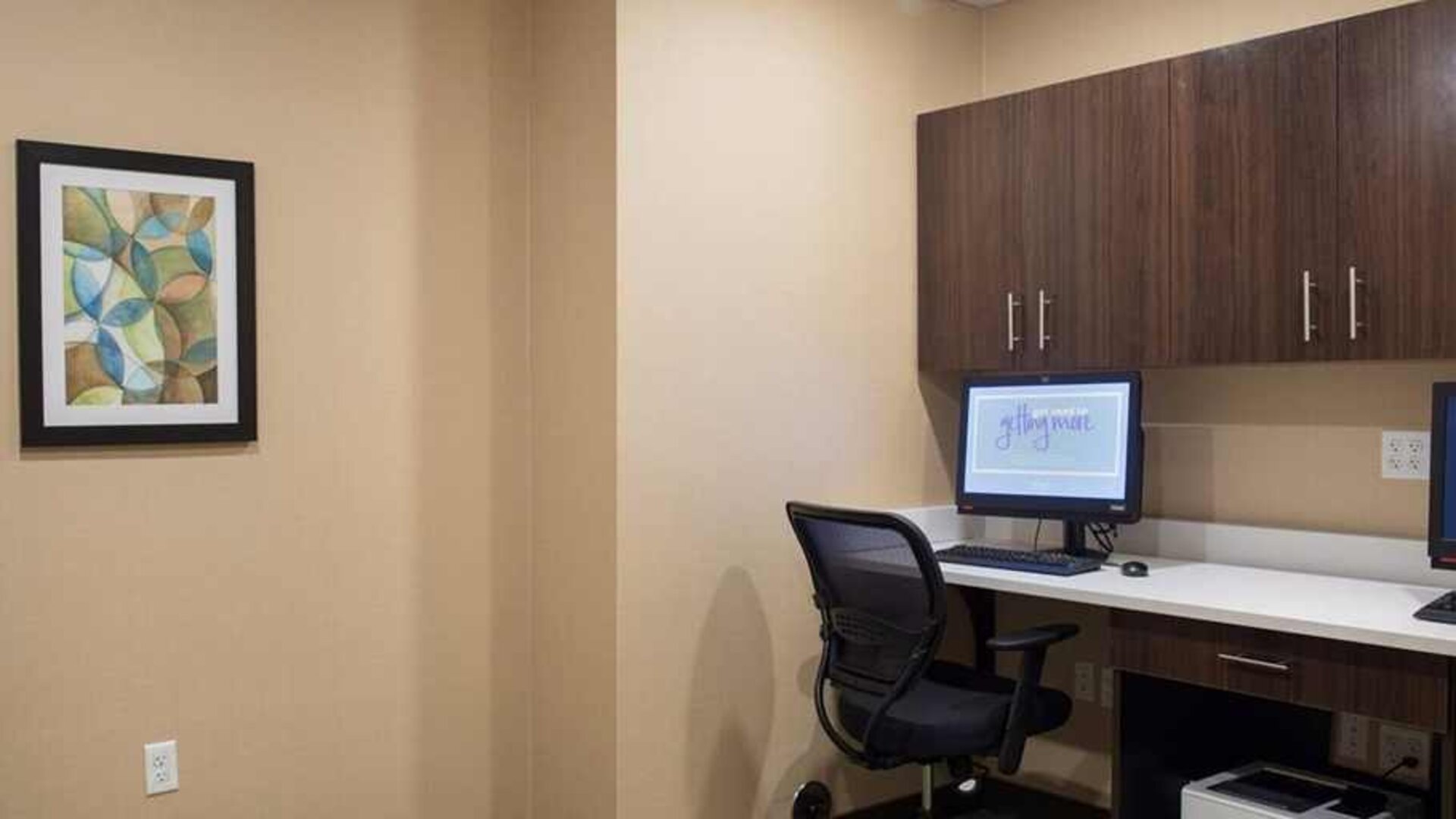 Equipped work desk and work area at Hampton Inn Big Rapids, MI.
