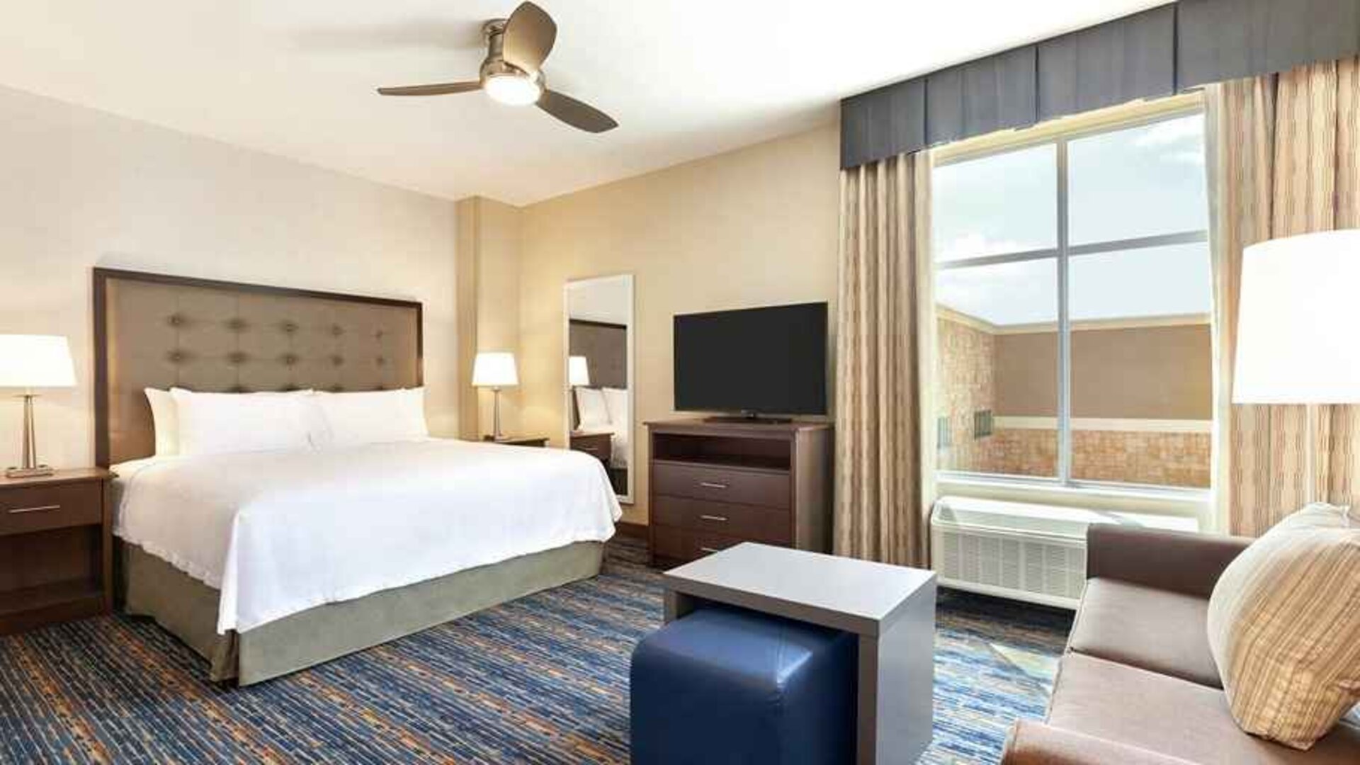 large king studio suite with natural light at Homewood Suites by Hilton Harlingen.