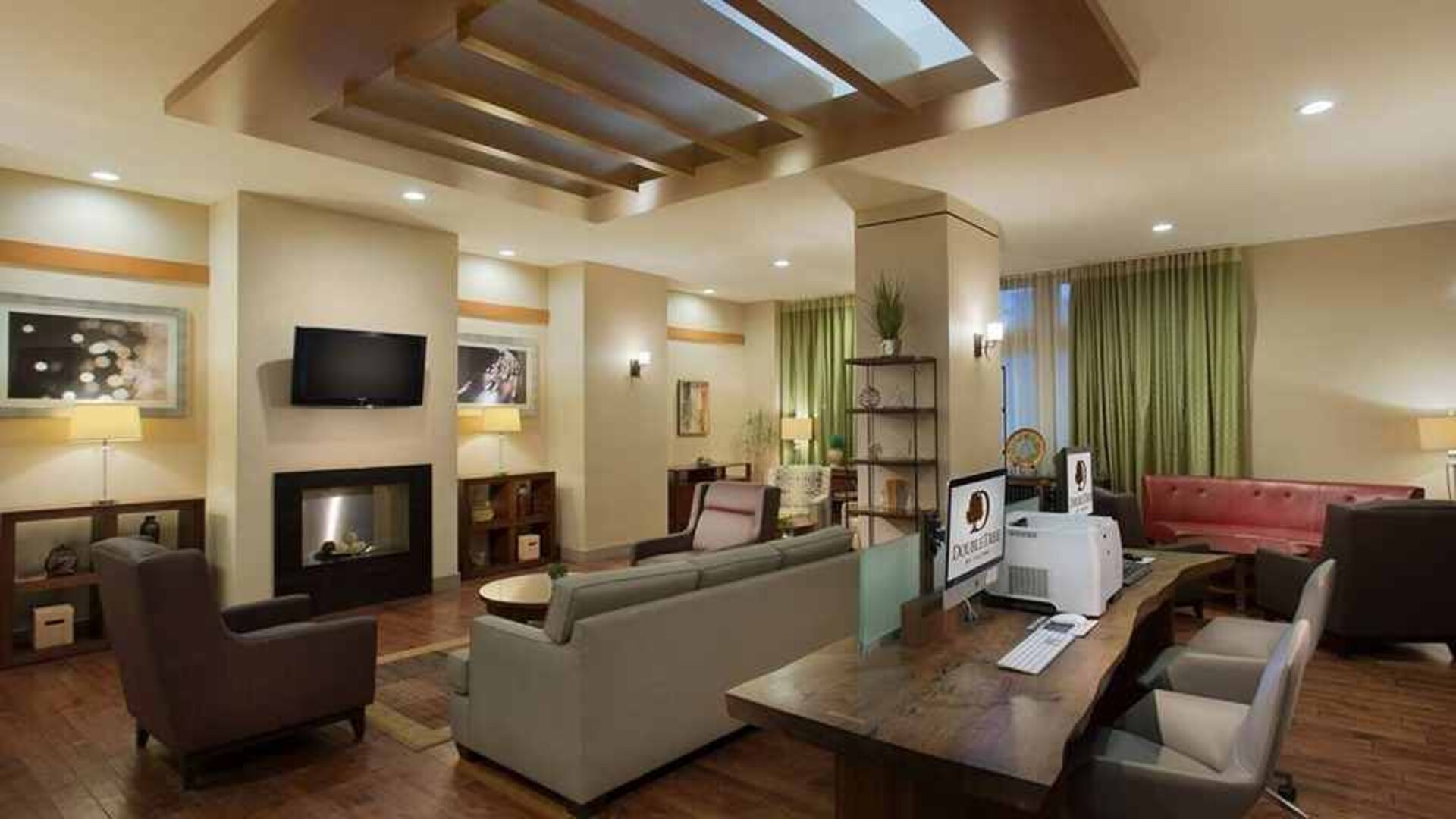 comfortable lounge and workdesk with online facilities at DoubleTree by Hilton Los Angeles - Norwalk.