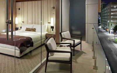 Beautiful balcony in a hotel guestroom at the Statler Dallas, Curio Collection by Hilton.