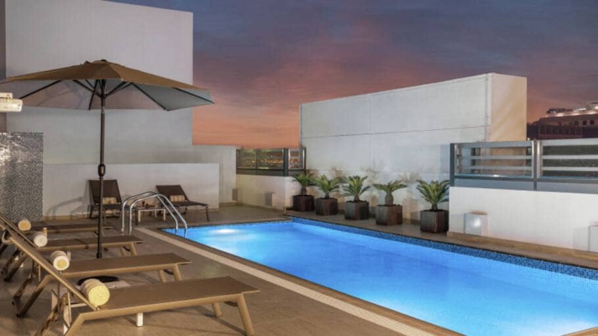 Beautiful outside pool with pool side chairs