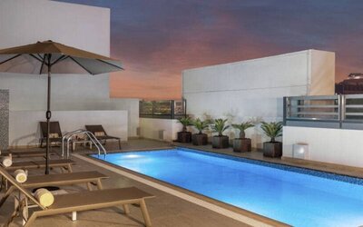 Beautiful outside pool with pool side chairs