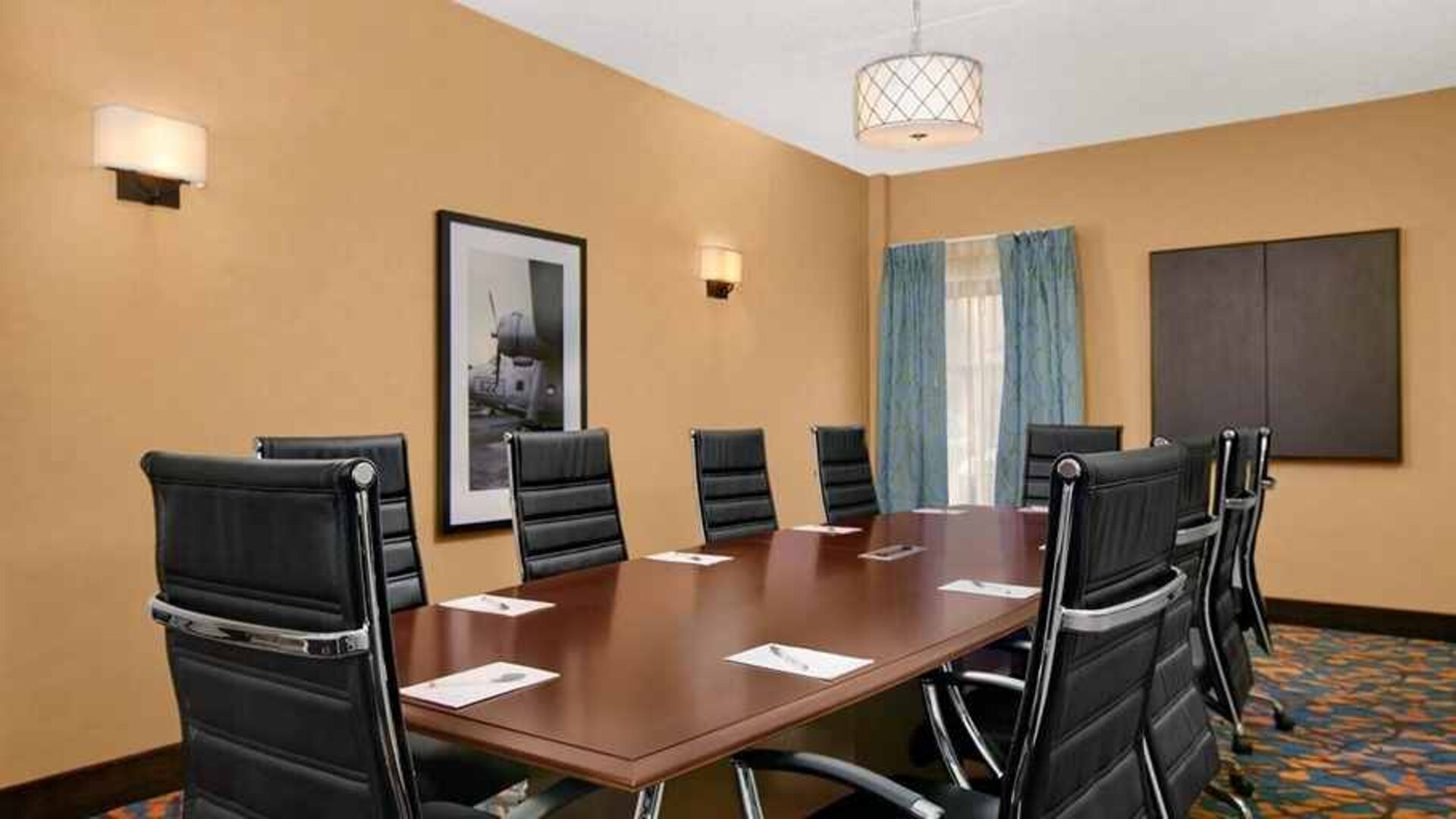 Dedicated meeting room with business desk at Hampton Inn Chicago-Midway Airport.