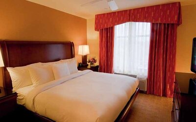 luxurious king suite at Homewood Suites by Hilton Rockville-Gaithersburg.