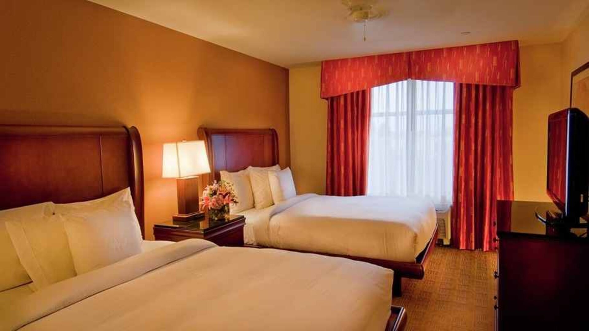 luxurious queen room with TV at Homewood Suites by Hilton Rockville-Gaithersburg.