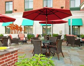 lovely outdoor garden patio for relaxing or coworking at Homewood Suites by Hilton Rockville-Gaithersburg.