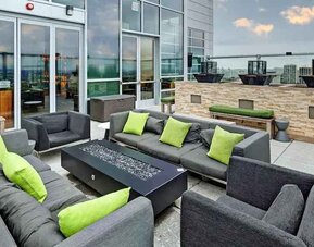 Outdoor terrace with lounges perfect as workspace at the Hilton Garden Inn Chicago McCormick Place
