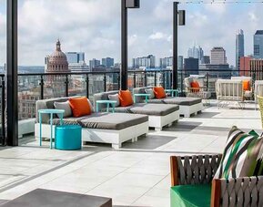 Beautiful rooftop-coworking space with city views at Hilton Garden Inn Austin University.
