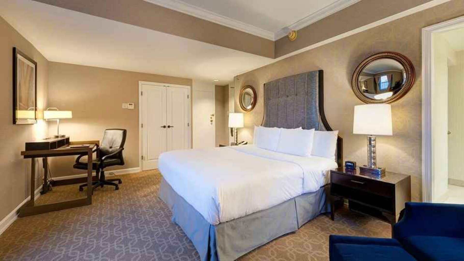 Spacious king room with work desk perfect for remote work at Hilton Milwaukee City Center.