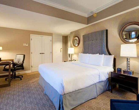 Spacious king room with work desk perfect for remote work at Hilton Milwaukee City Center.