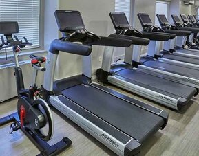 Well-equipped fitness center at Hilton Milwaukee City Center.