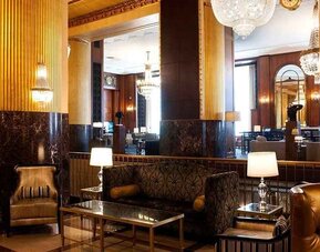 Cozy lobby-lounge area ideal for coworking at Hilton Milwaukee City Center.