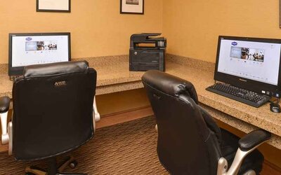 Dedicated business center with printer, computers, and internet at Hampton Inn & Suites Pueblo-Southgate.